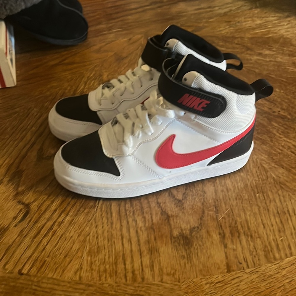 Red black and white Nikes size 4y great condition